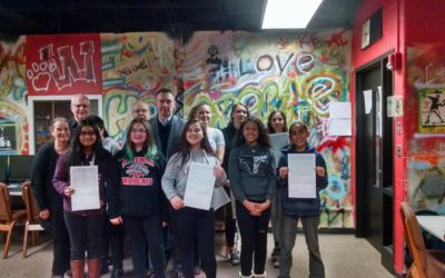 Presenting DDA Art Challenge Awards at Wilkinson Middle School